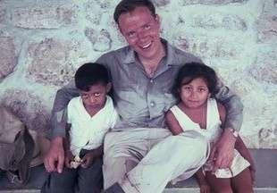 A young Bernhard Winkler abroad with two children